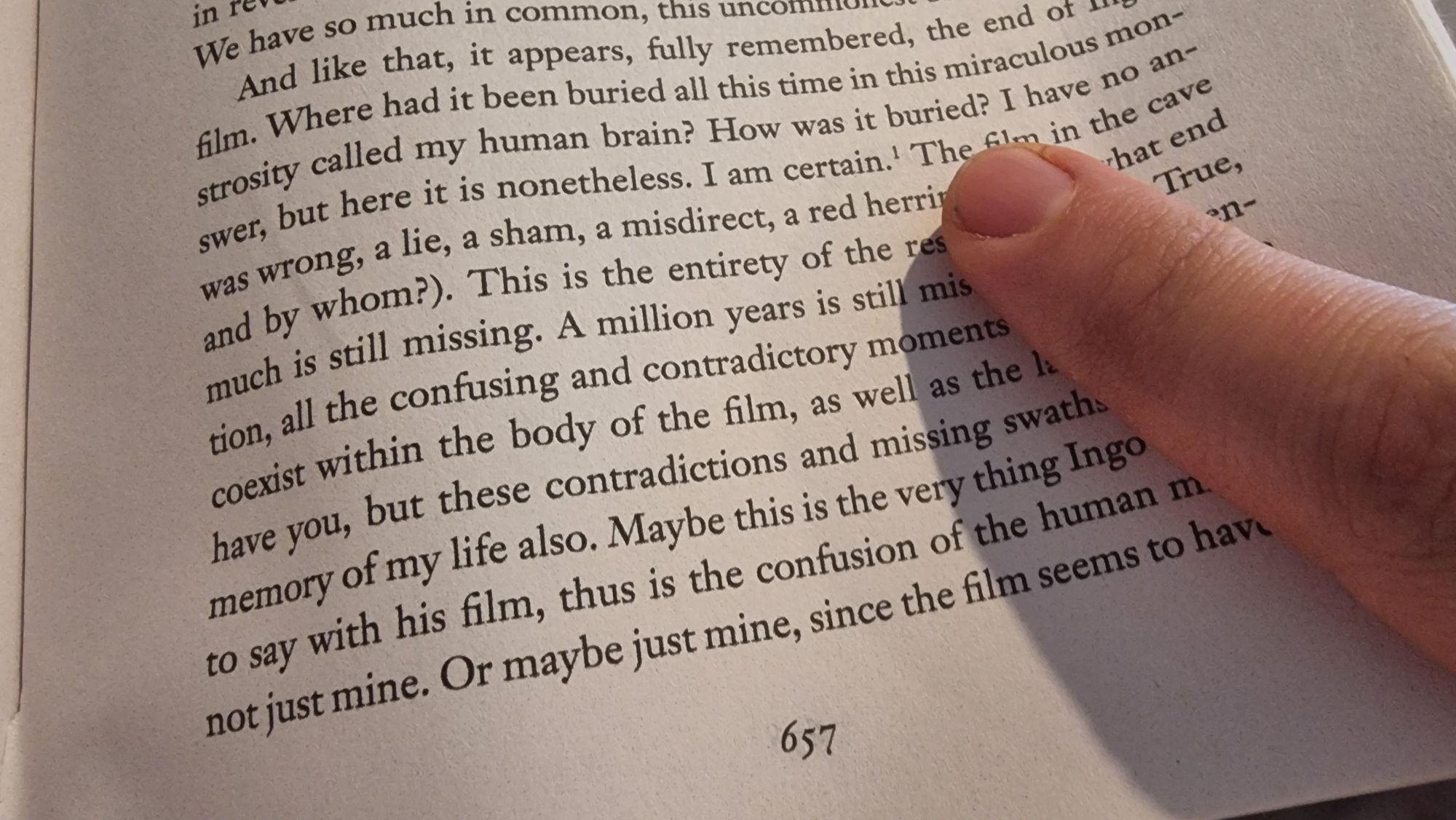 Full image of Page 657 of the book, featuring a number 1 footnote (indicated by a finger).
