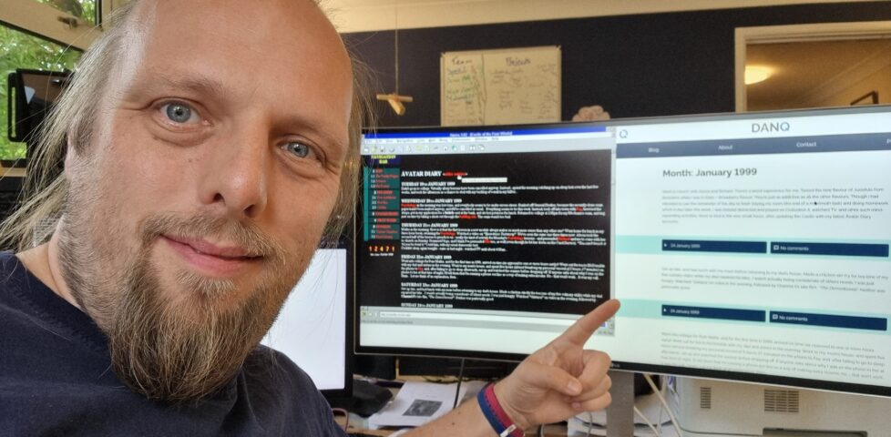 Dan poses in front of circa 1999 and present-day copies of his blog, both showing posts from January 1999.