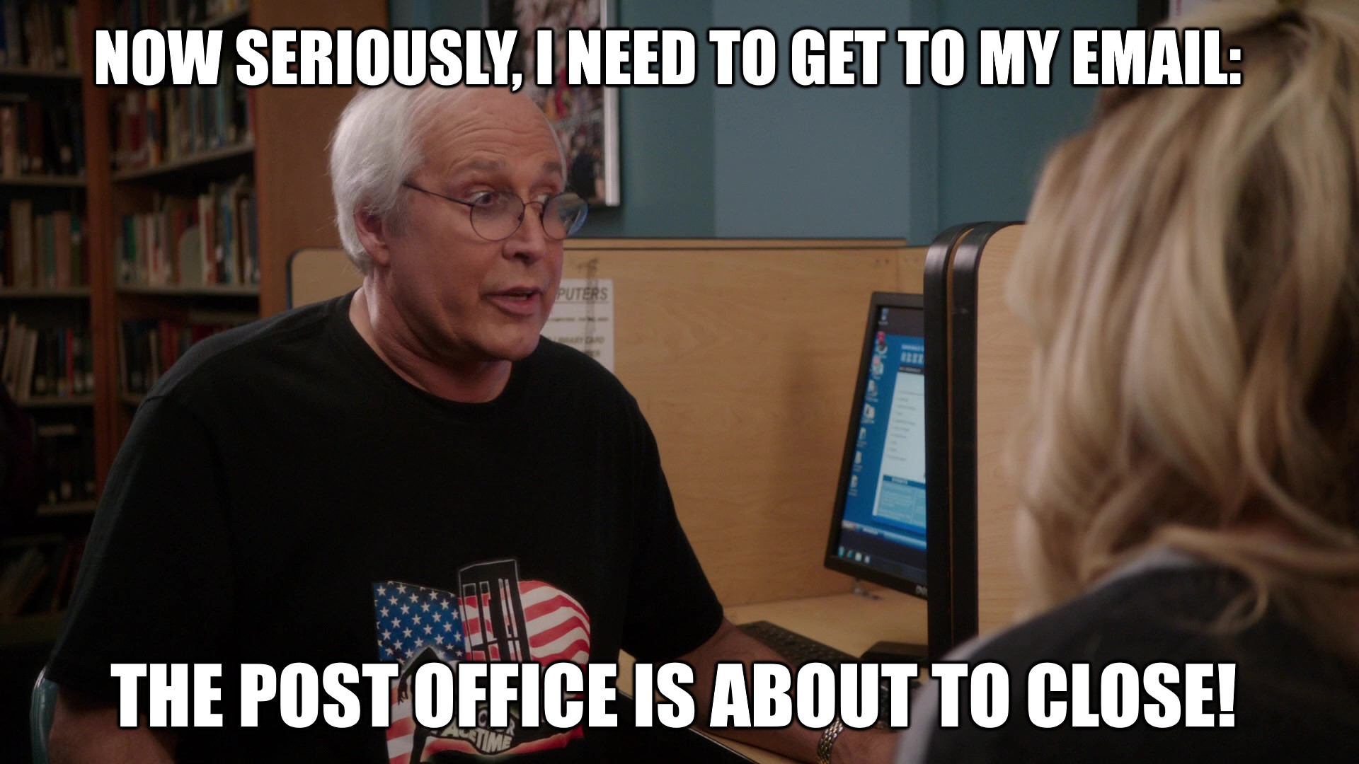 Full image of In Community Season 4, Episode 8 (Herstory of Dance), Pierce Hawthorne (Chevy Chase), wearing an Inspector Spacetime t-shirt, sits in a computer lab, saying "Seriously, I need to get to my email: the Post Office is about to close!"