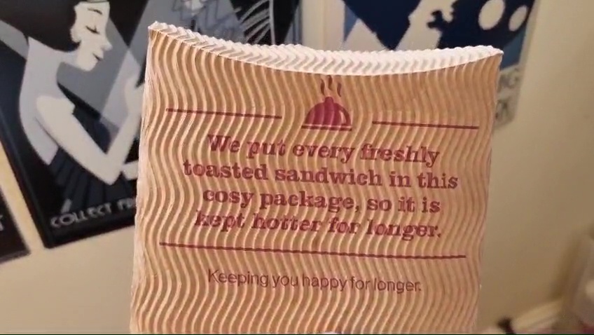 An empty Costa sandwich packet.