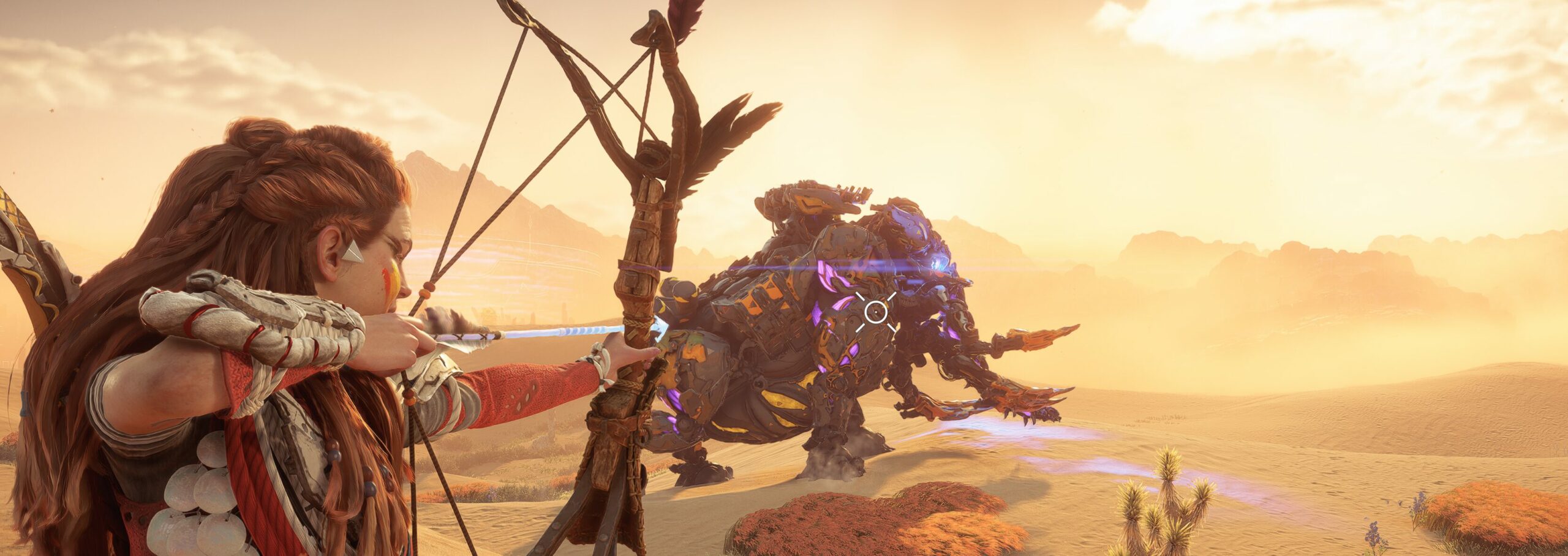 Full image of Aloy aims a precision longbow at a Tremortusk, an elephant-like machine, in a sunny desert environment.