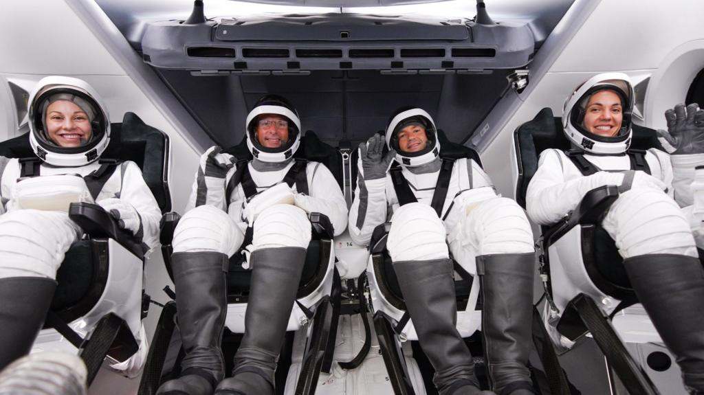 Full image of The Polaris Dawn crew (billionaire Jared Isaacman, accompanied by a retired US Air Force pilot and two SpaceX employees) preparing to launch.