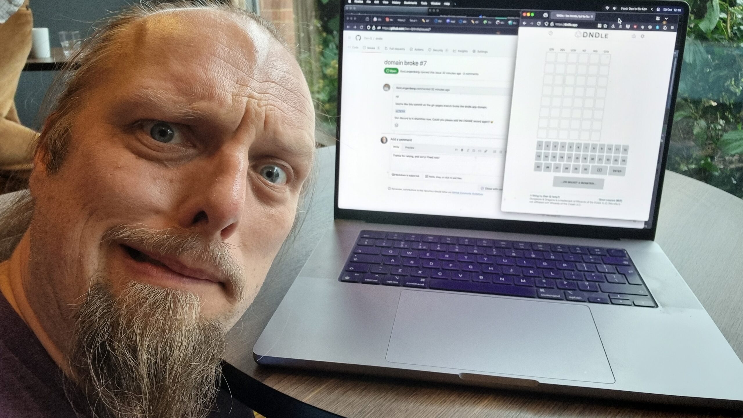 Full image of Dan, looking concerned, in front of Github and Dndle.app.