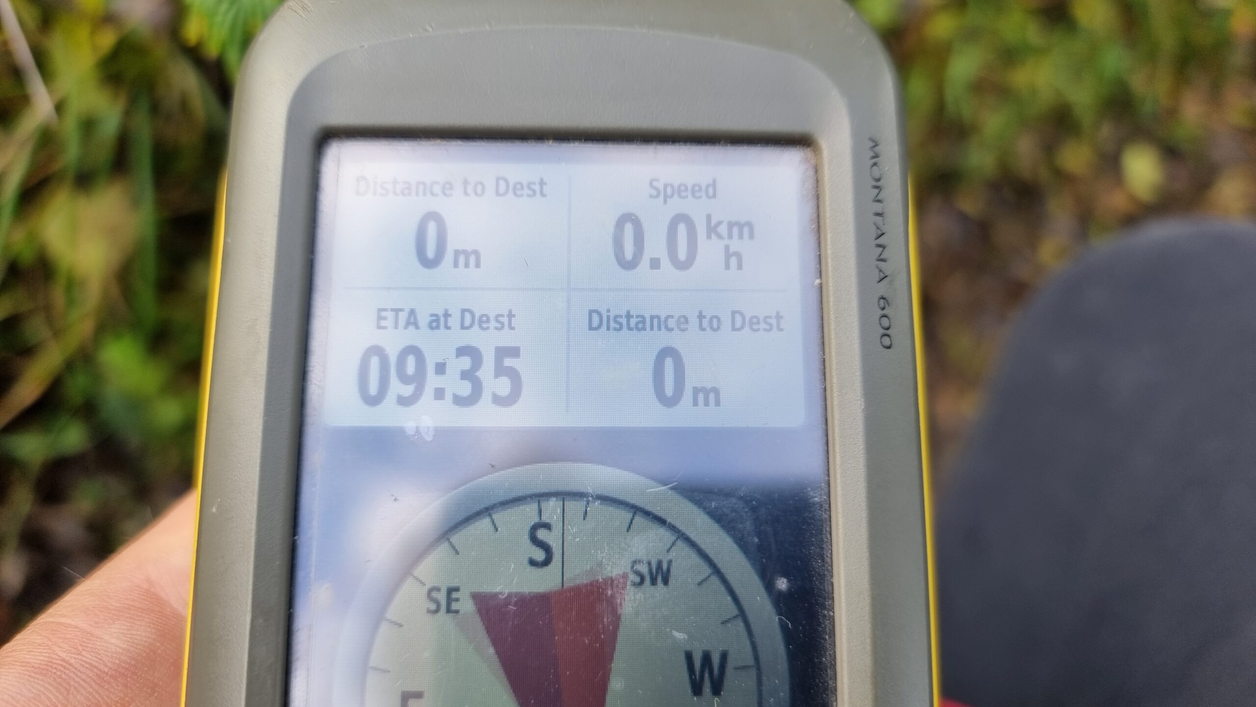 Full image of A GPS receiver shows "0 metres" to destination.