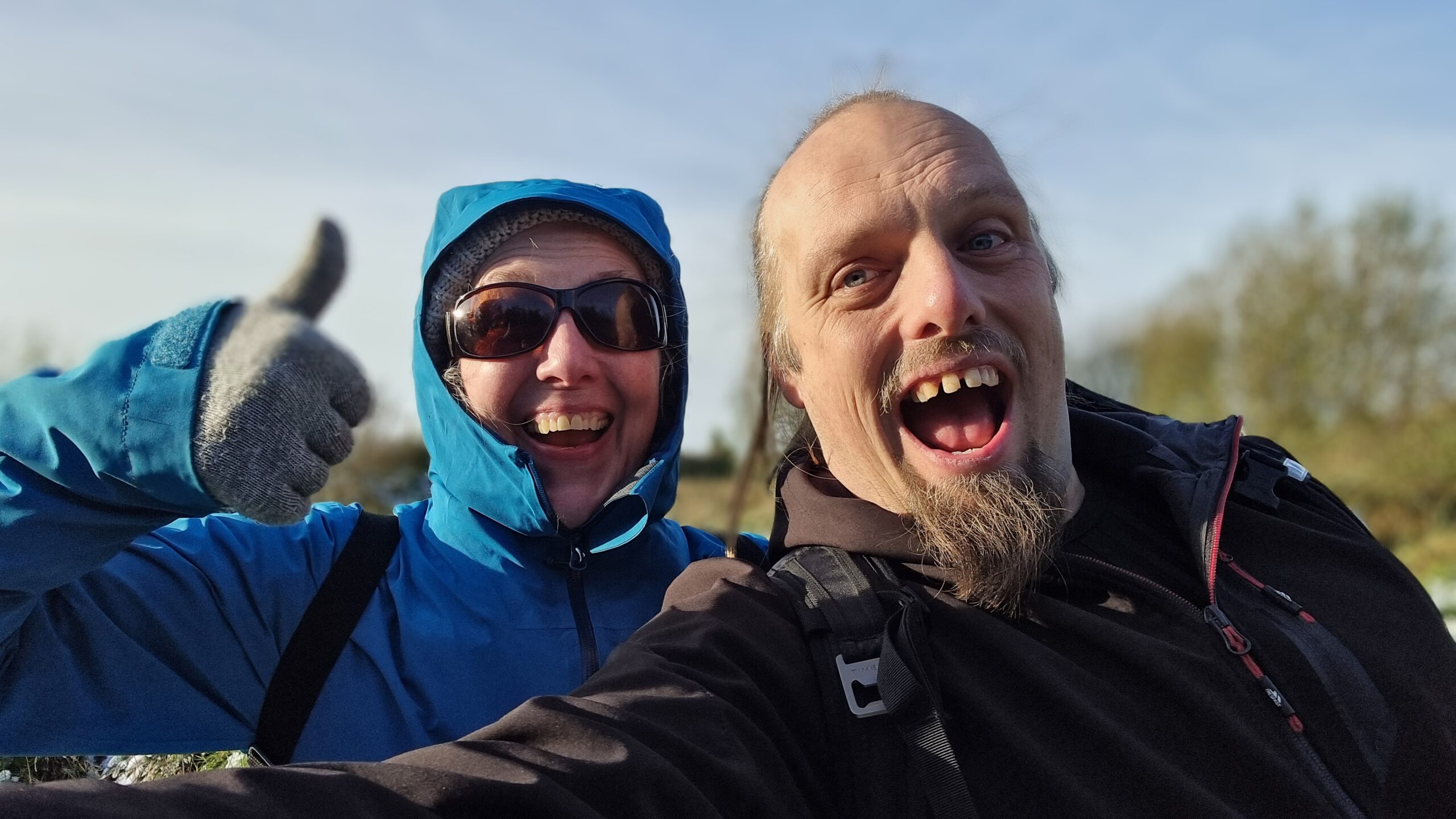 Full image of Dan and his mum grinning.