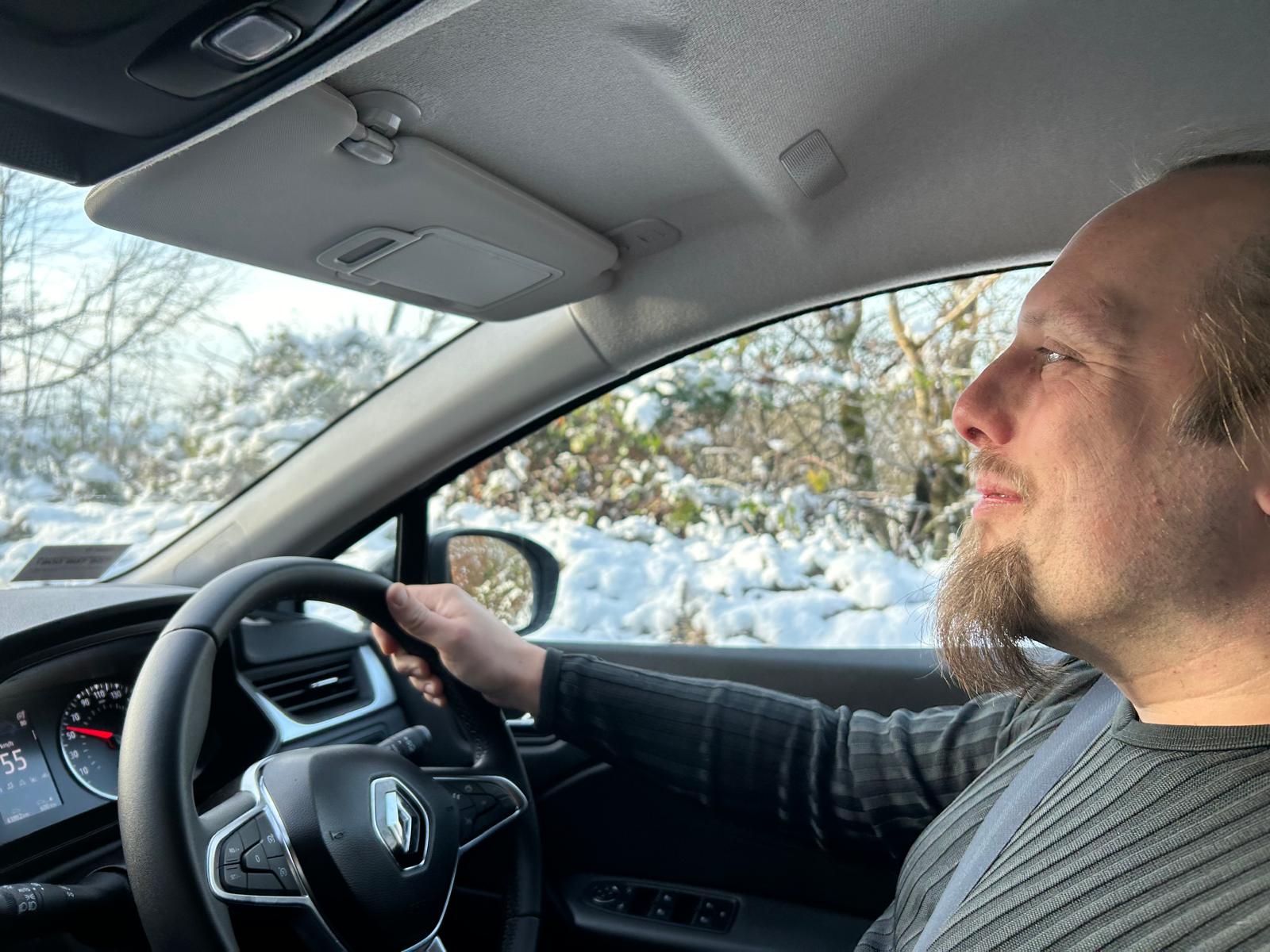 Full image of Dan driving.