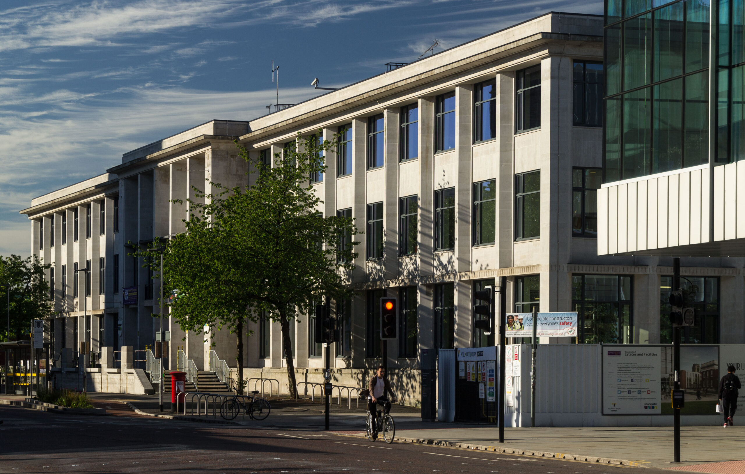 Full image of Three-storey building on a city street.