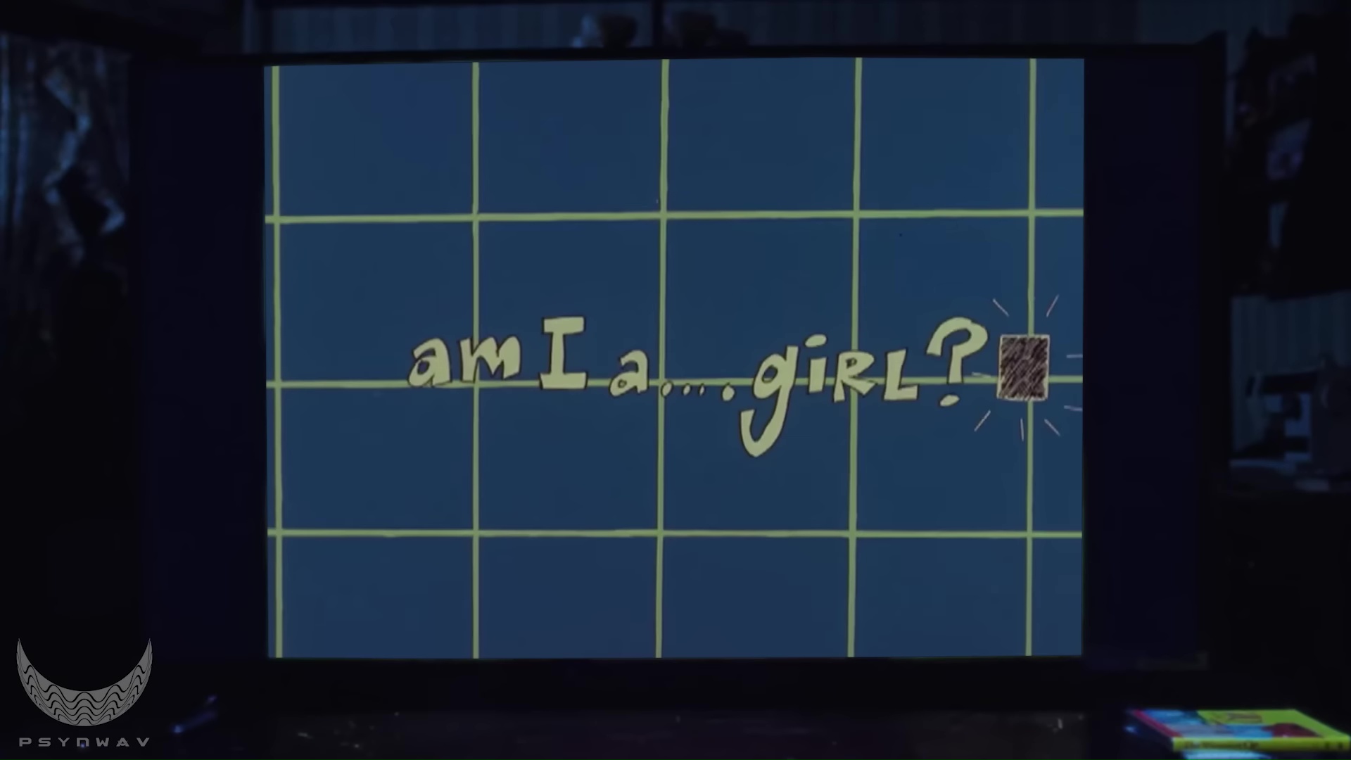 Full image of TV screen showing pencil-outlined text that reads 'am I a...girl?"