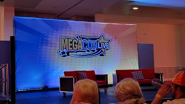 Convention stage with MegaConLive branding.