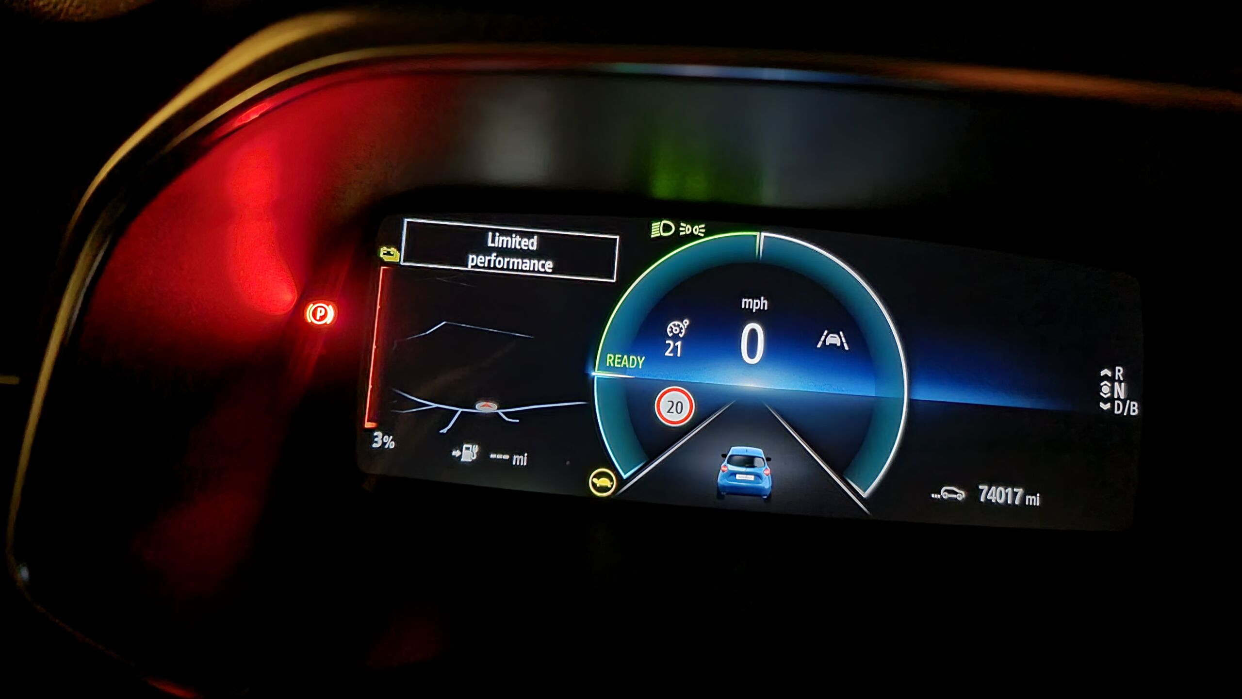 Full image of Electronic car dashboard showing 3% battery, a 'limited performance' warning, and an icon of a turtle in a yellow circle.