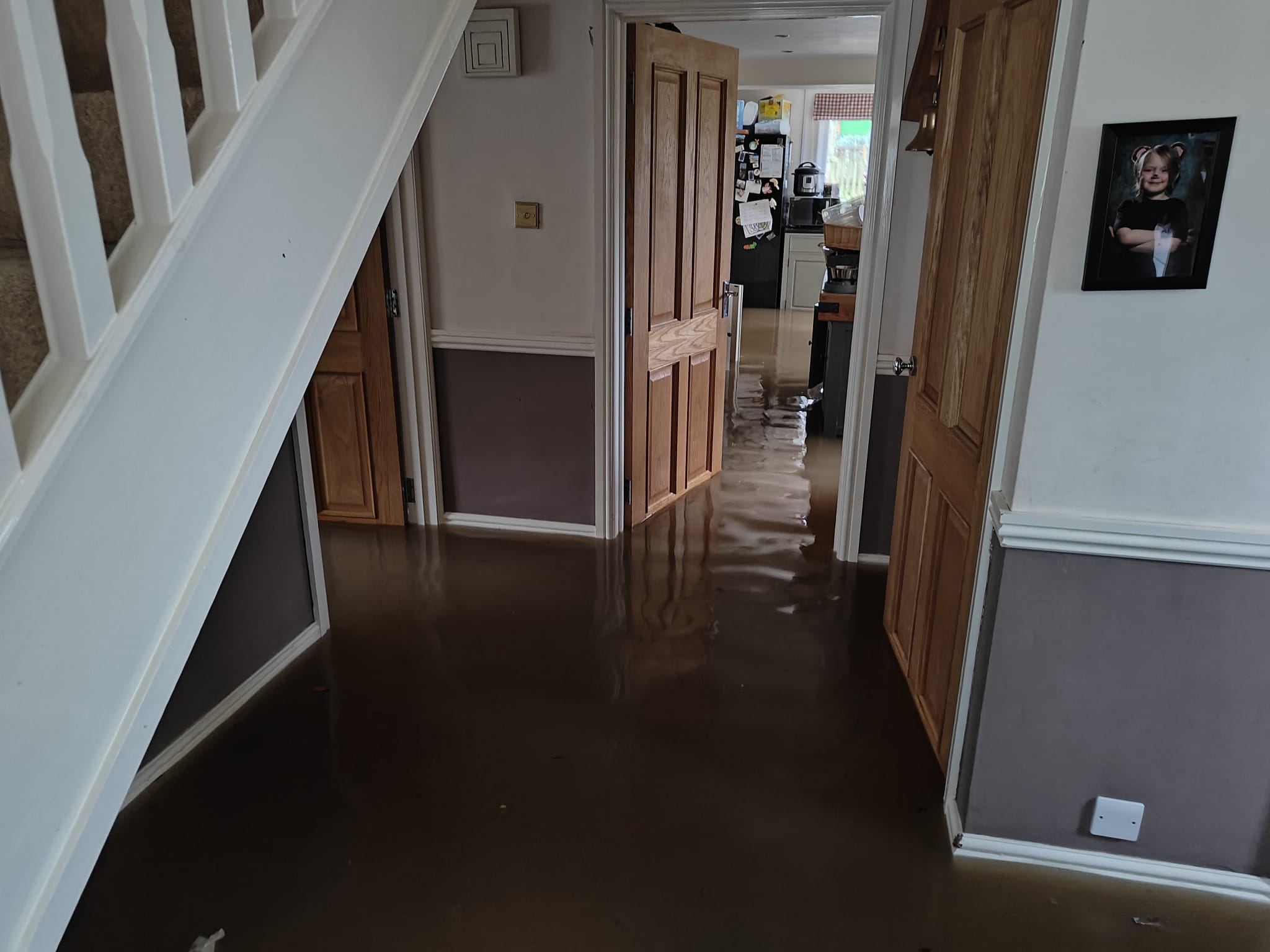 Full image of A flooded hallway.