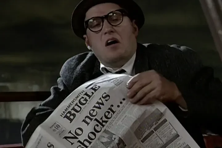 Some pissed old fart reading a newspaper called "The Hammersmith Bugle" with the headline "No news shocker..."