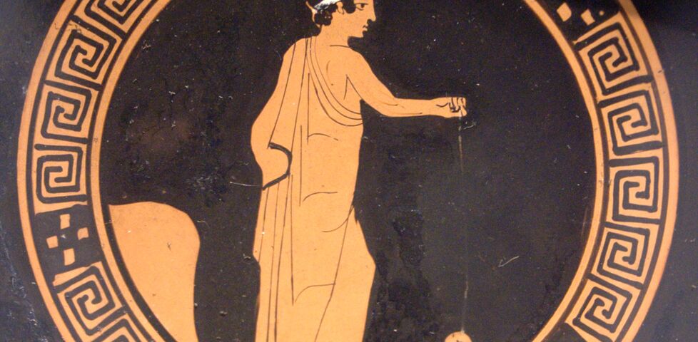 Boy playing yo-yo. Tondo of an Attic red-figure kylix, ca. 440 BC.