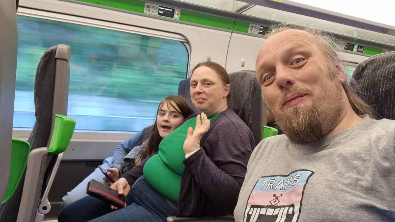 Full image of Dan on a speeding train.